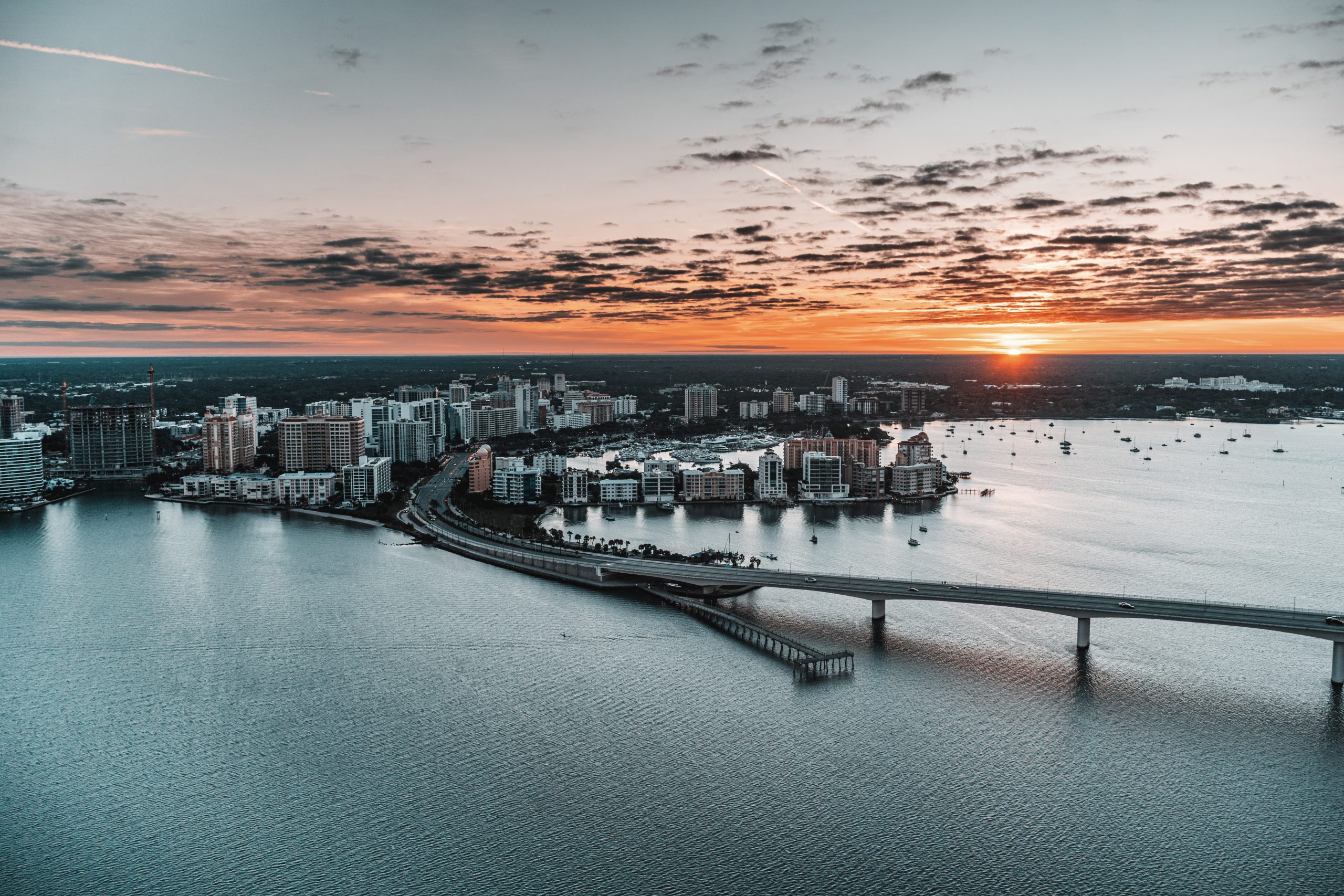 Aerial image of ocean and city