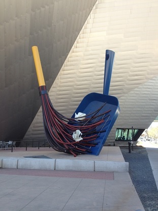 An enormous broom and dustpan at the Denver Art Museum