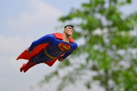 Superman toy in flight
